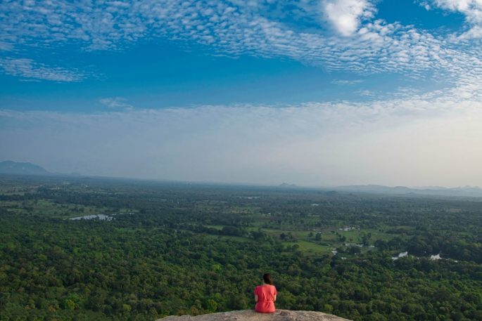 Girl looking at the view from Pidurangala Rock