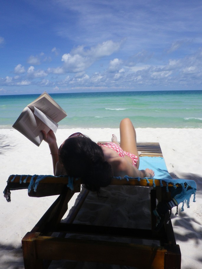 Reading on the beach in Vietnam