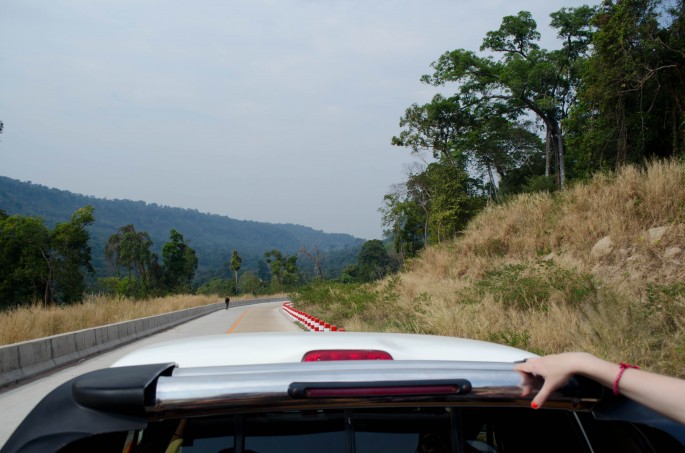 Riding in the back of a pick-up truck to reach Preah Vihear Temple