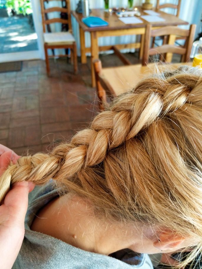 Hair braiding at Moinhos Velhos