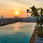 sunset seen from outdoor rooftop pool over Colombo